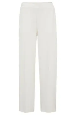 Pantalones de pinzas en punto de piqué