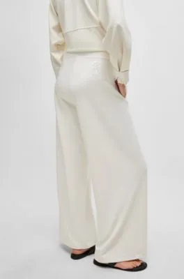 Pantalones de pinzas en punto de piqué