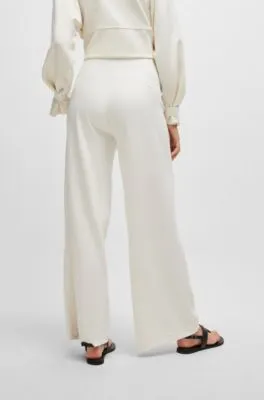 Pantalones de pinzas en punto de piqué
