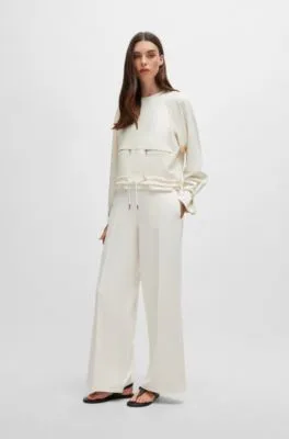 Pantalones de pinzas en punto de piqué